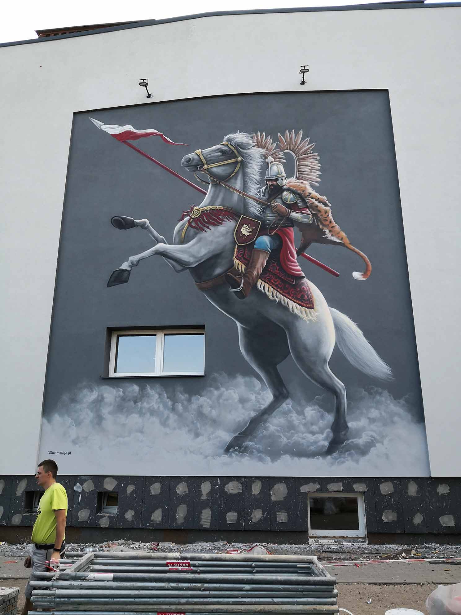 mural przedstawiający husarza wykonujący pesadę